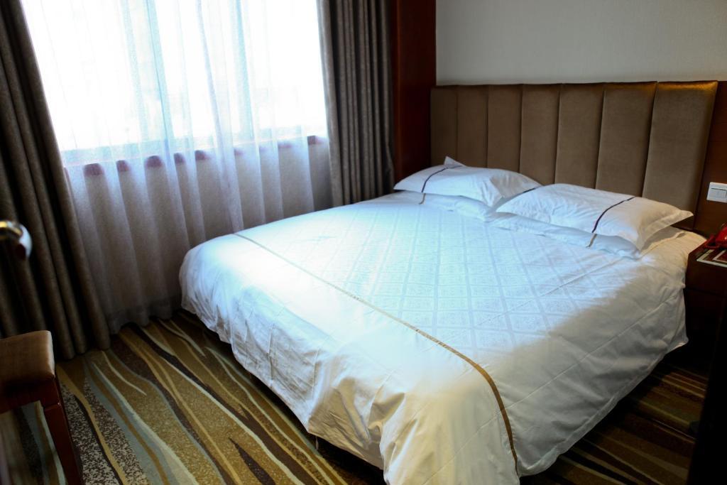 Kaifu Hotel Kanton Pokoj fotografie