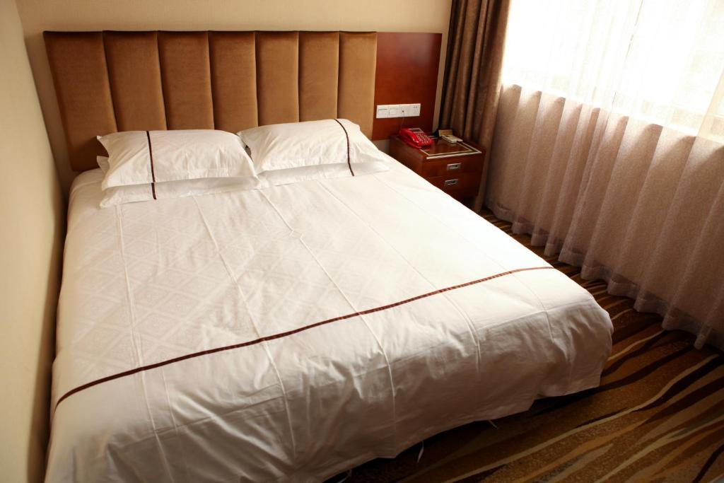 Kaifu Hotel Kanton Pokoj fotografie